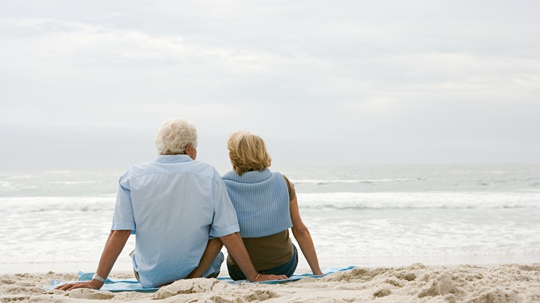 Couple sitting on a beach