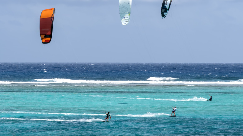 three kitesurfers on Rodrigues Island