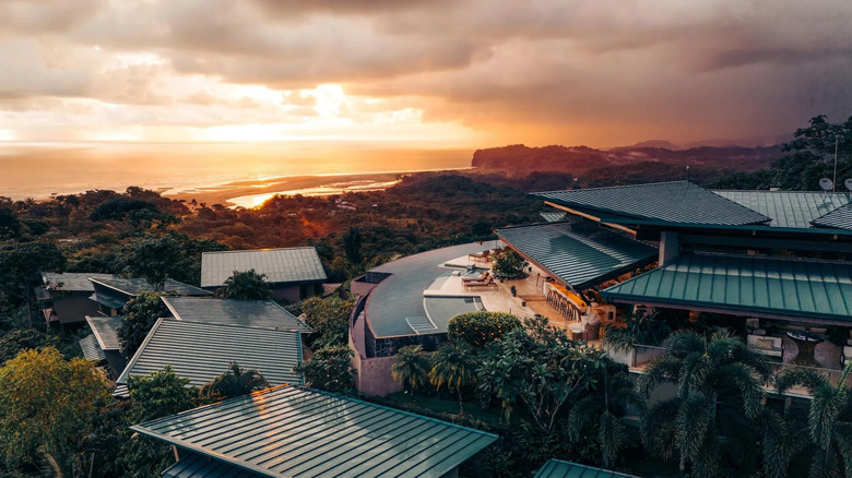 The sun sets over Hotel Three Sixty's rooftops
