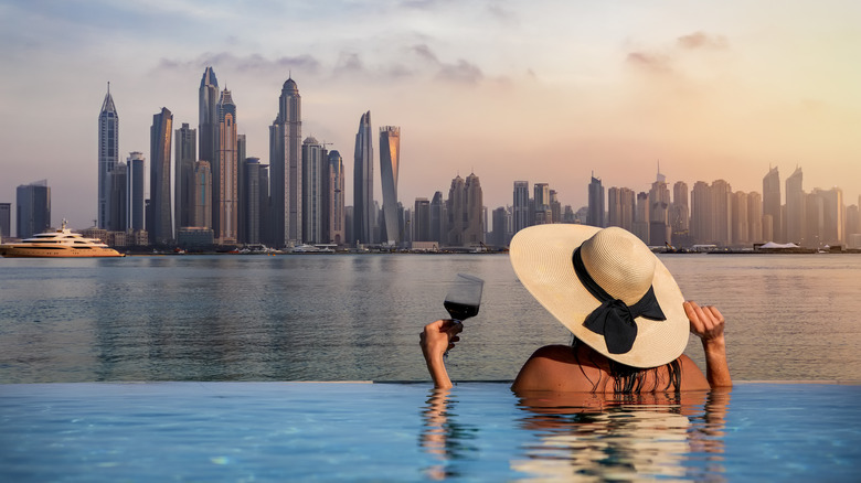Woman in hotel pool in Dubai