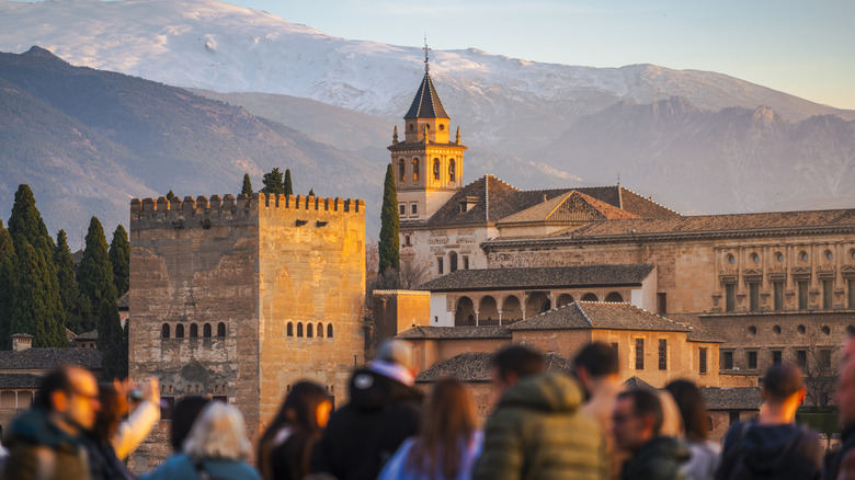 Tourists photographing the Alhambra in Granada, Spain