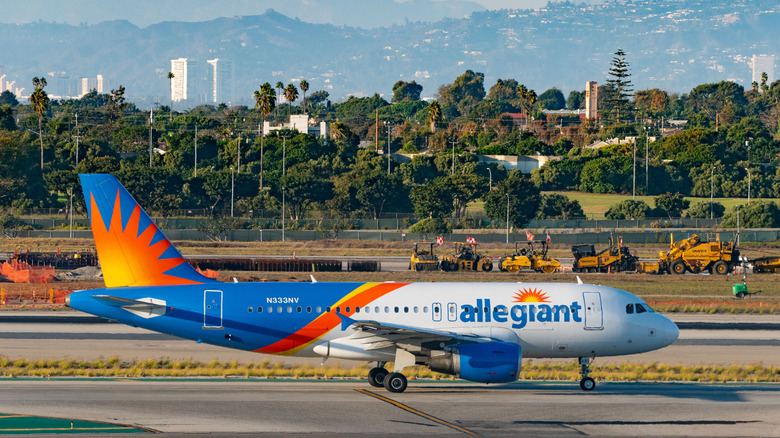 Allegiant Air Airbus A319-111 taxiing the runway at Los Angeles International Airport