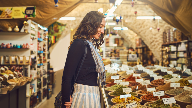 Woman shopping for spices