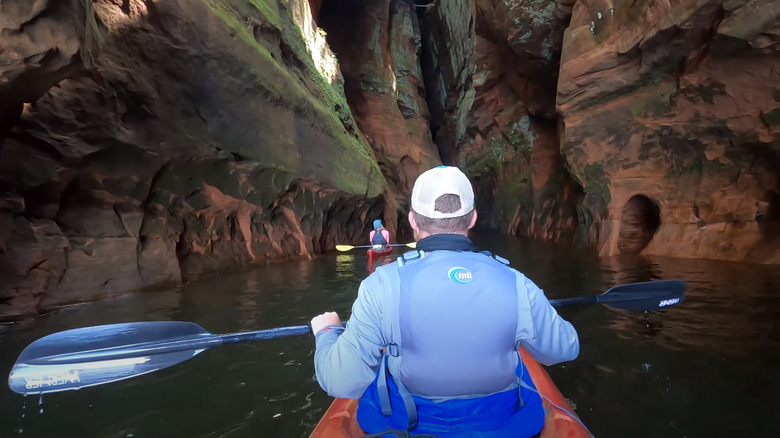 Kayaking through sea caves