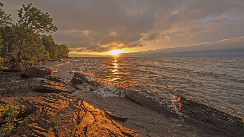 Sunset over Lake Superior shoreline at Porcupine Mountains Wilderness State Park