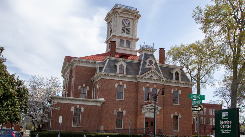 red brick building with clock tower