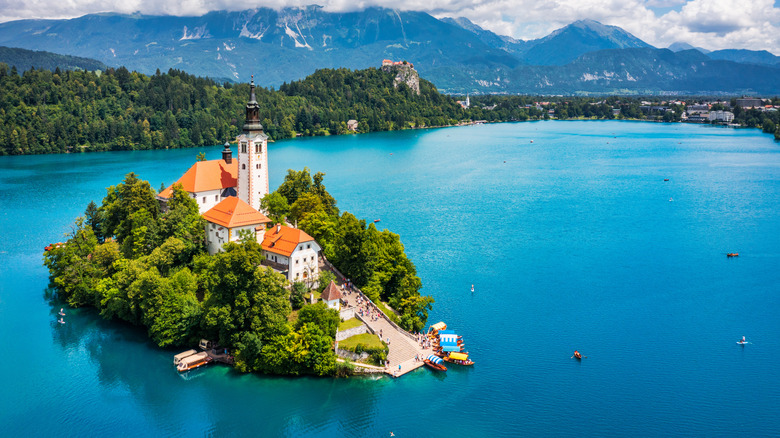 Lake Bled in Slovenia, beautiful mountains with small Pilgrimage Church