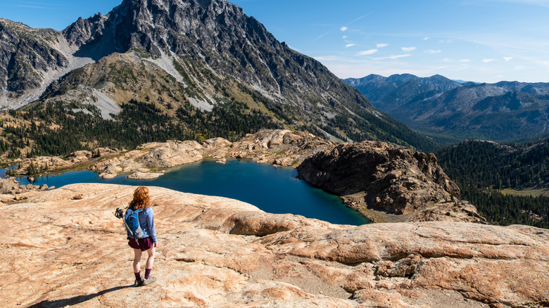 a woman hiking to Lake Ingalls in the Cascade Range in Washington State