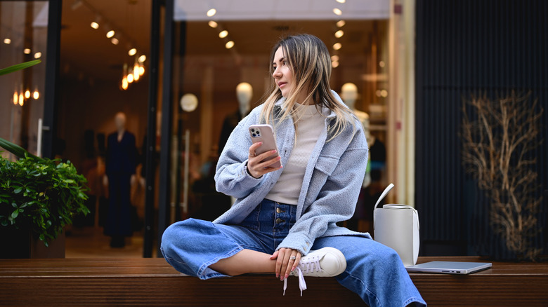 Woman in straight-leg jeans