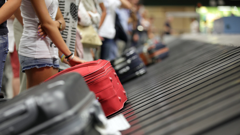 People at baggage claim
