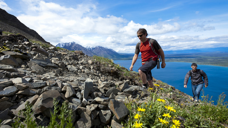 Two hikers in Kluane National Park and Reserve, Yukon, Canada.