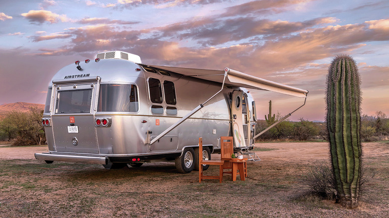 This Retro Airstream Model Is A Charming Choice For RV Camping In Mid-Century Luxury