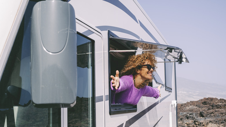 Happy woman in an RV