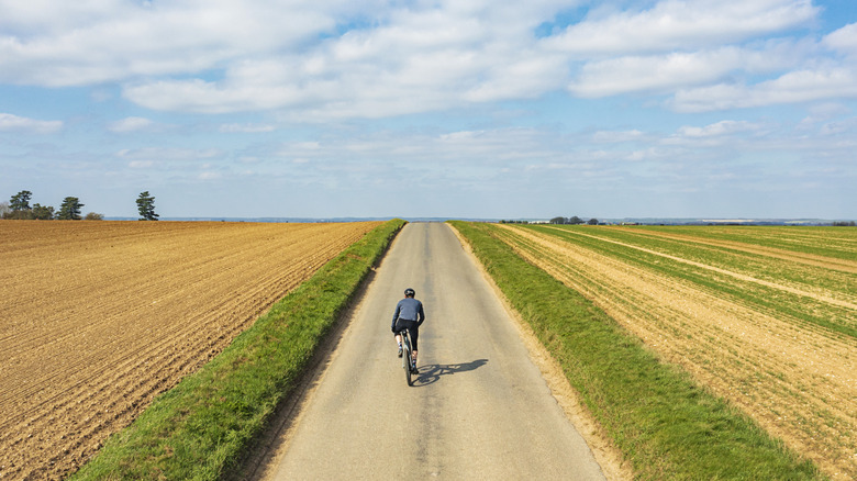 A cyclist on a scenic byway