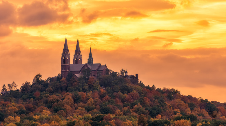 Basilica on hill at sunset