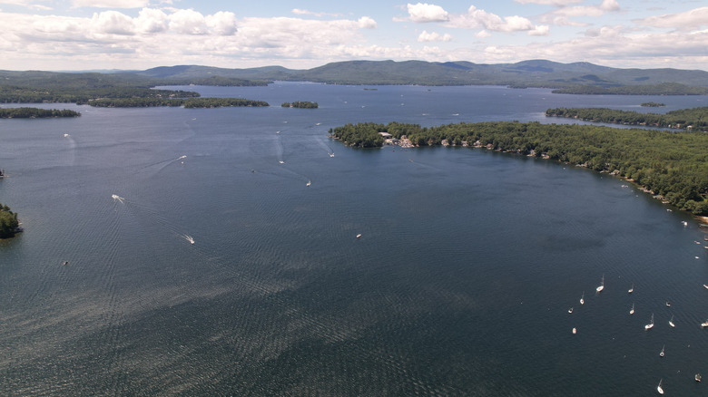 an aerial view of Newfound Lake along Wellington State Park in the Lakes Region of New Hampshire