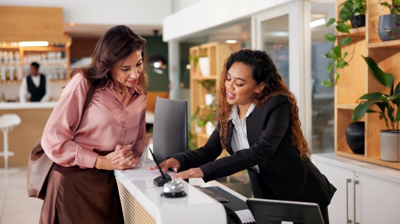 Traveler checking into hotel