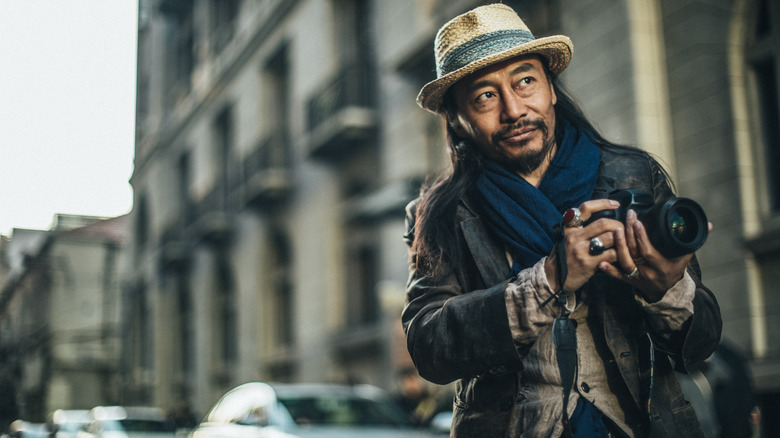 photographer dressed in layers