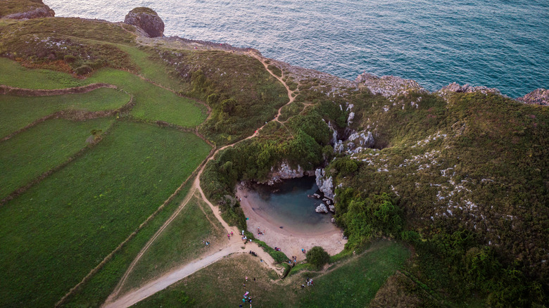 Aerial of Gulpiyuri Beach at sunset