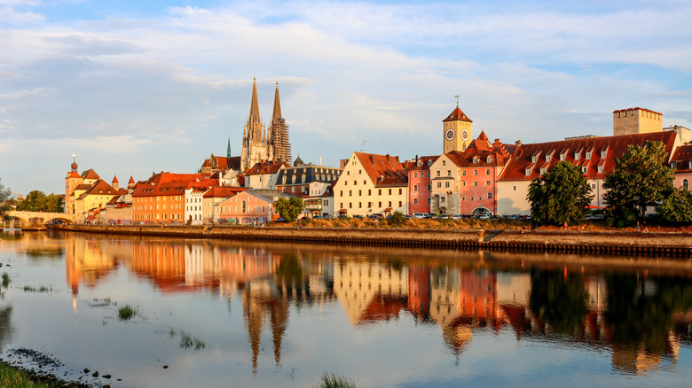 Historic skyline of Regensburg with the Danube in the foreground