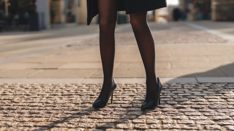 High heels on cobblestone