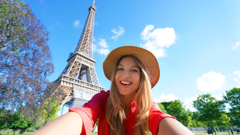 Woman takes selfie in Paris