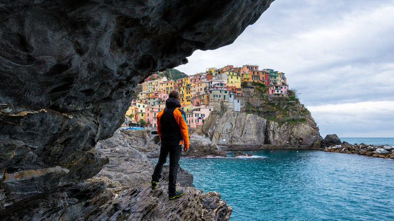 hiker with views of Manarola