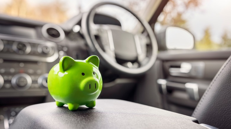 piggy bank on car console