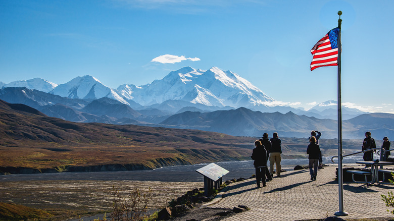 Tourists looking at Denali peak