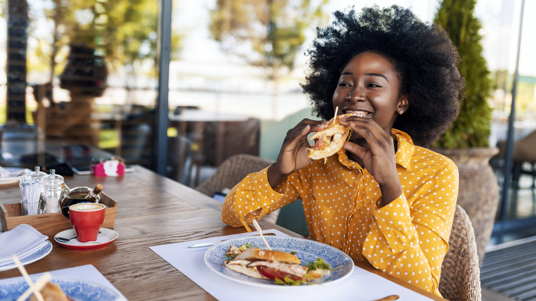 Woman eating a sandwhich