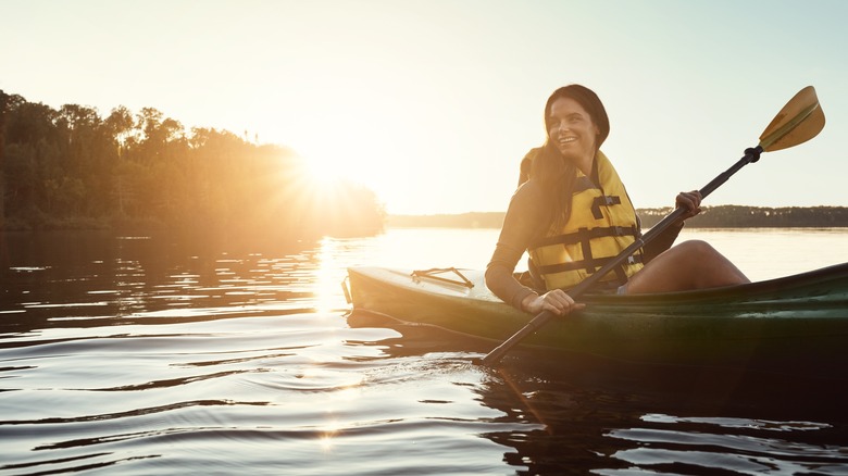 Young woman kayaking