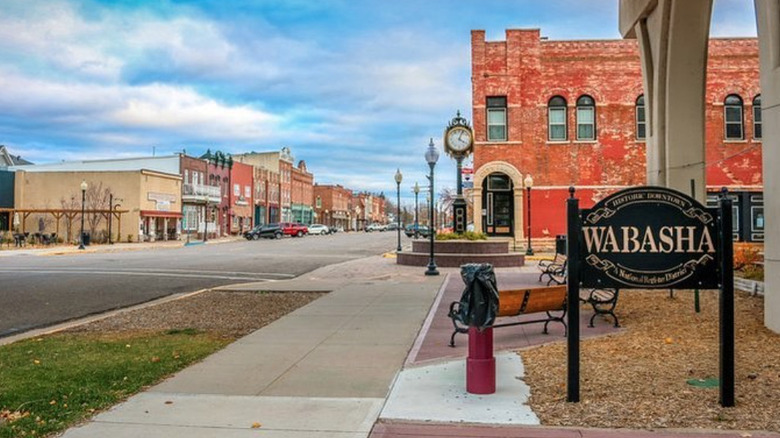A photo of downtown Wabasha with red brick buildings and a quiet street