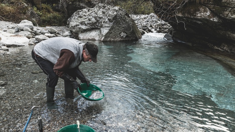 Panning for gold river outdoors