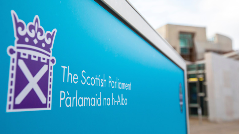 A close up of the Scottish Parliament sign in Edinburgh.