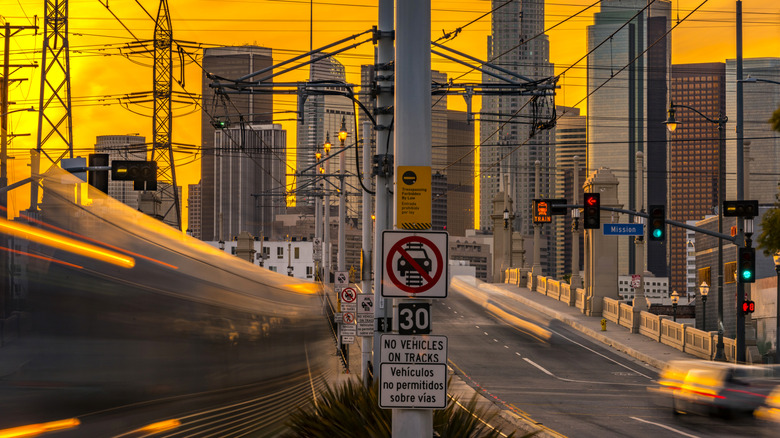 A train hurtles away from downtown Los Angeles