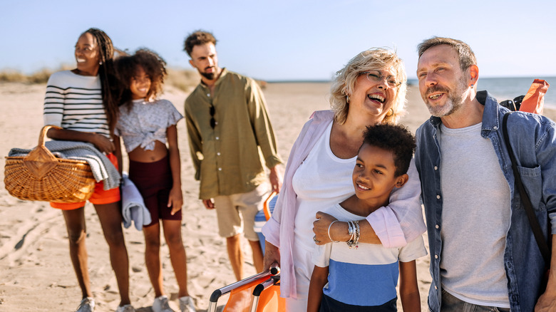 large family at beach