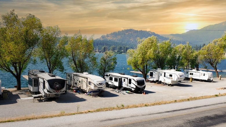 A line of RVs overlooks the water at Waitts Lake in Washington State