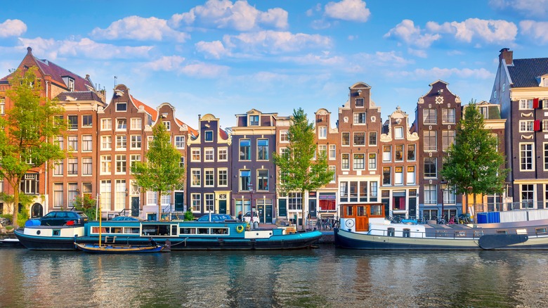 View of iconic Amsterdam houses along the canal
