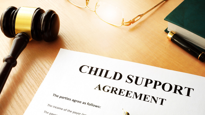 A document titled Child Support Agreement next to a gavel.
