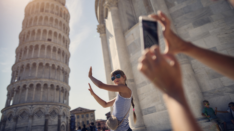 Tourist at Tower of Pisa