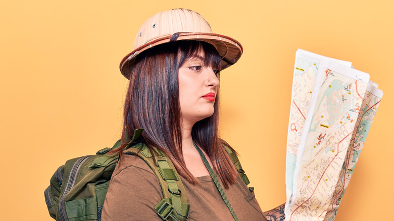 woman looking at map