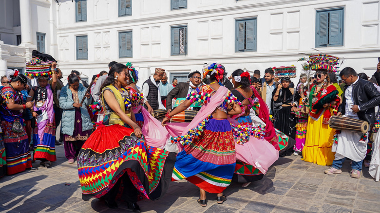 The Tharu community performing a cultural dance during the celebration of the Maghi festival in Kathmandu.