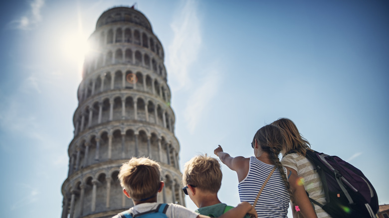 Family visiting Leaning Tower of Pisa