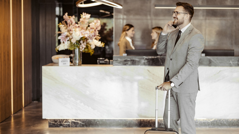 Business traveler in hotel lobby