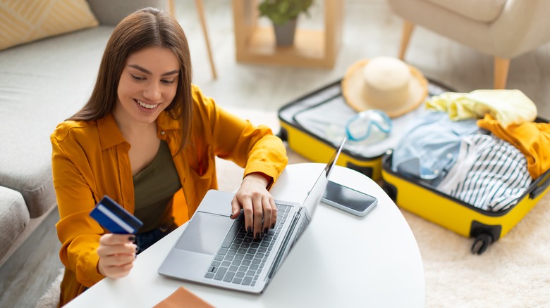 Woman booking a hotel