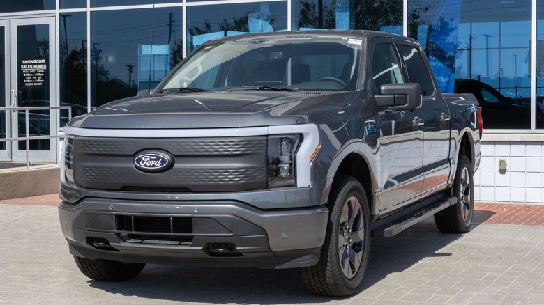 Ford F-150 Lightning in the dealership parking lot