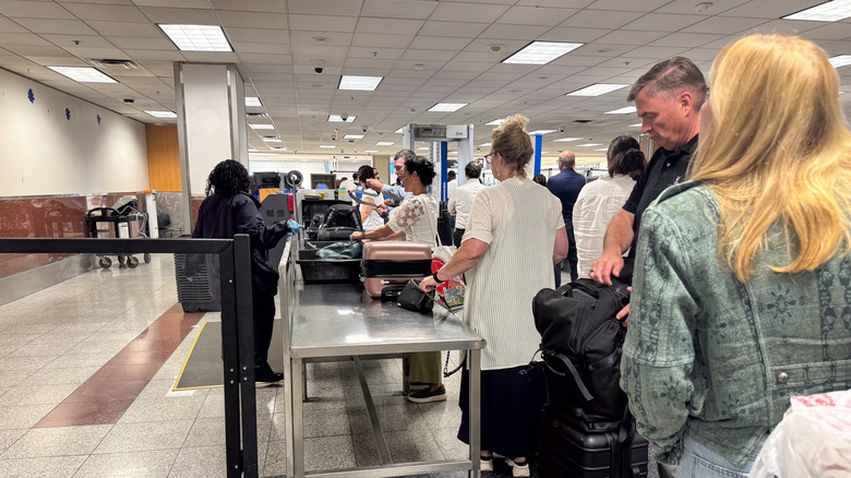 Travelers at TSA security checkpoint