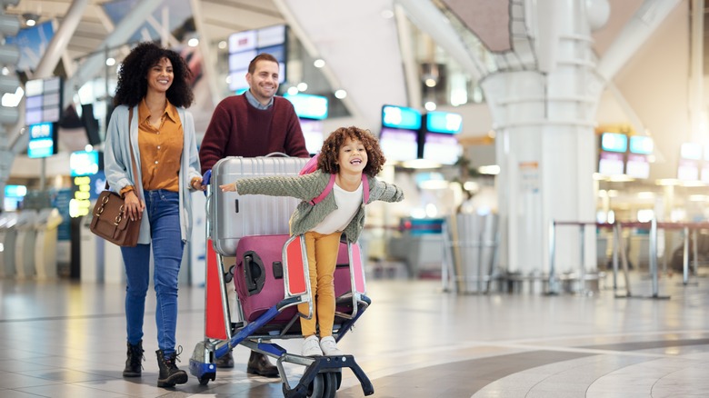 Happy family at airport