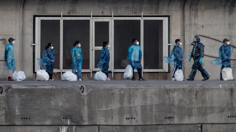 medical workers evacuate passengers in Spain