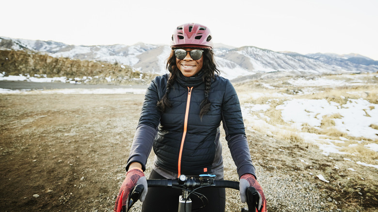 woman on bike in snow